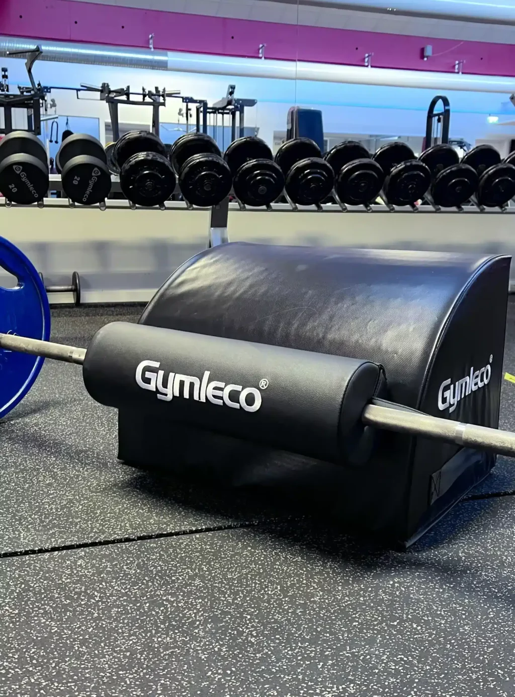 hip thrust barbell pad in gym environment